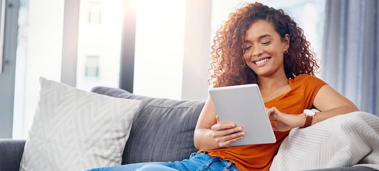 Woman contacting MidState Insurance Agency, Inc. on her tablet