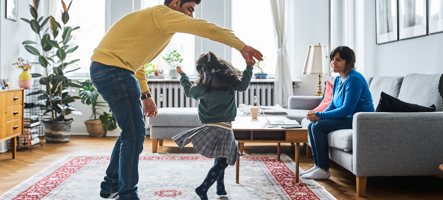 A family playing together in their living room in Pittsfield, Illinois